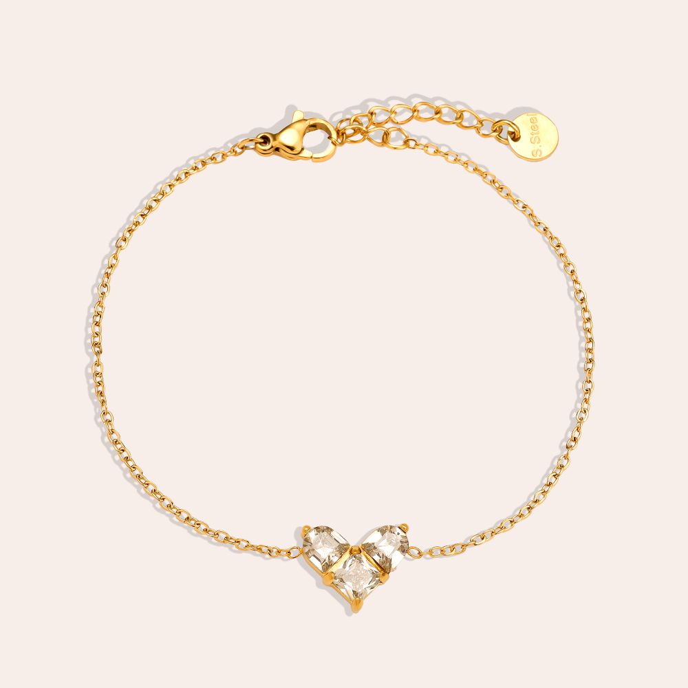 Vergoldetes Damenarmband mit Herzanhänger und funkelnden Zirkonia-Steinen von Finesse Feminine Jewelry