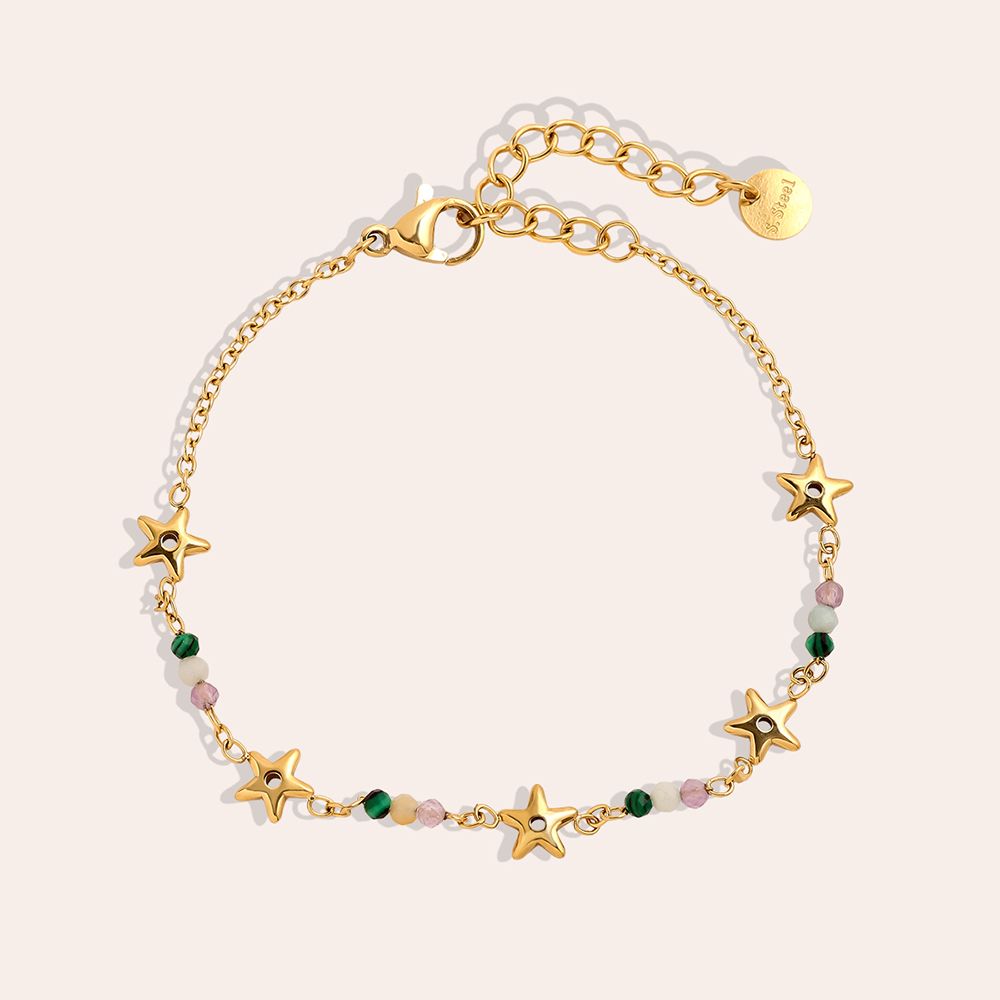 Vergoldetes Damenarmband mit feinen Kugel-Elementen und Stern-Details von Finesse Feminine Jewelry