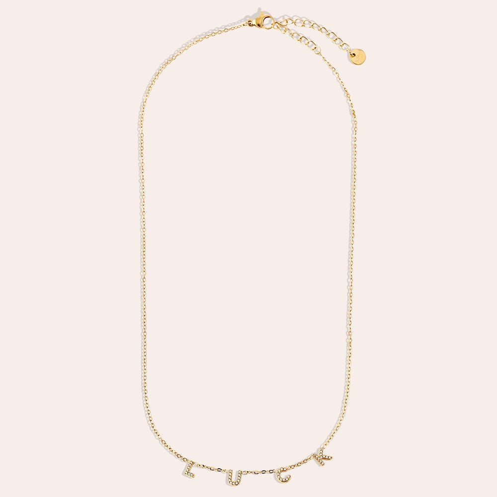 Vergoldete Damenhalskette mit Kleeblatt-Anhänger und funkelnden Zirkonia-Steinen von Finesse Feminine Jewelry