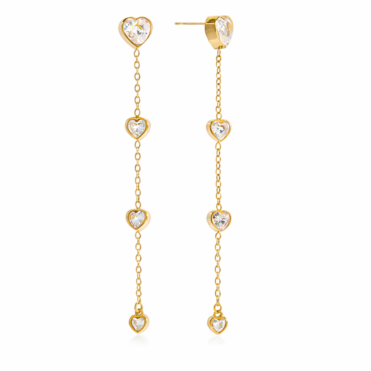 Goldene Ohrringe am Ohr getragen – Damen Schmuck