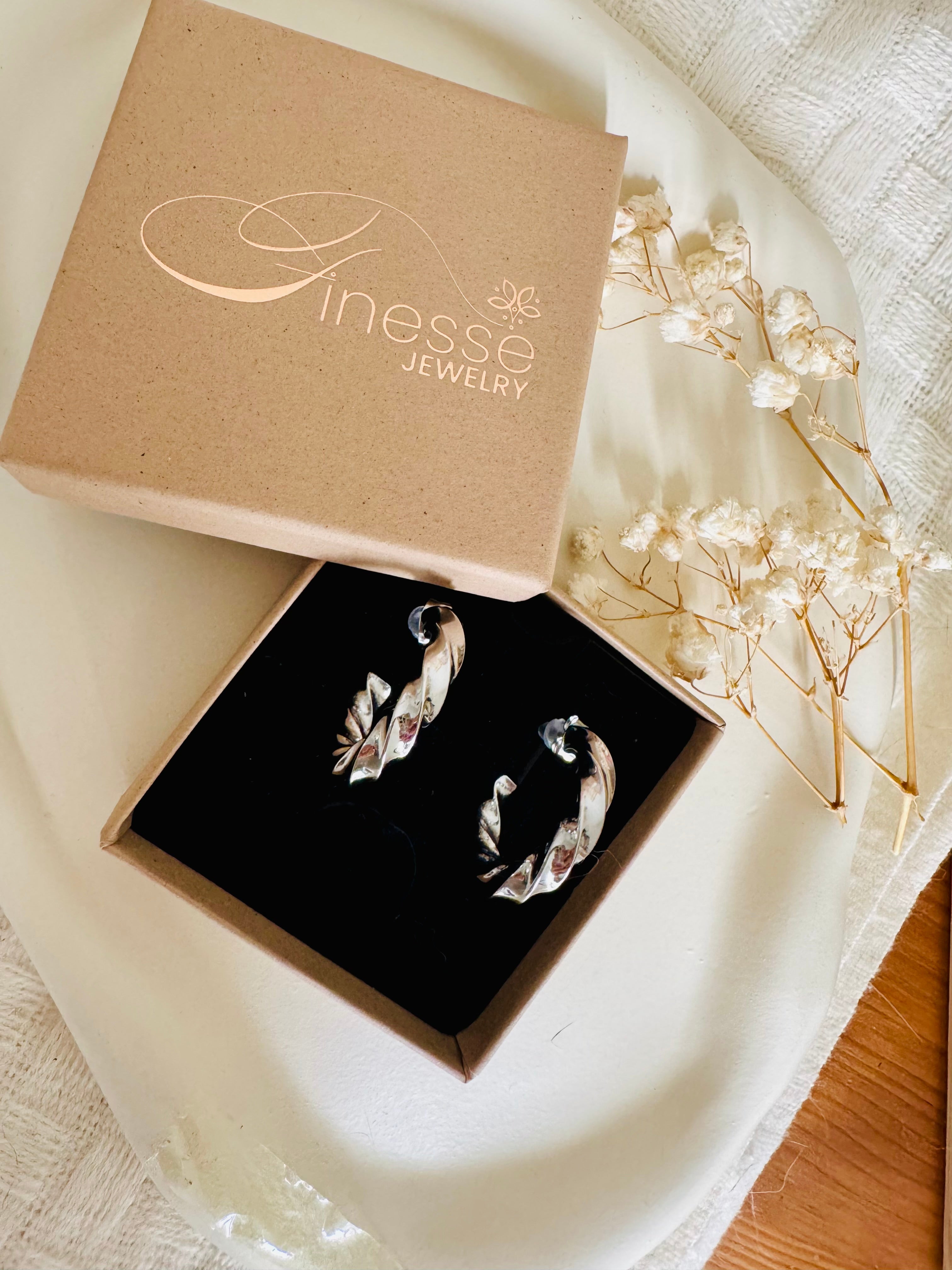 Twist &amp; Shine – Boucles d'oreilles créoles en argent